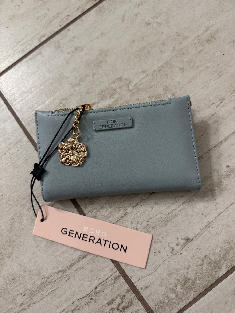 BCBG Generation Light Blue Zip Wallet with Gold Flower Charm.. nwt ..authentic